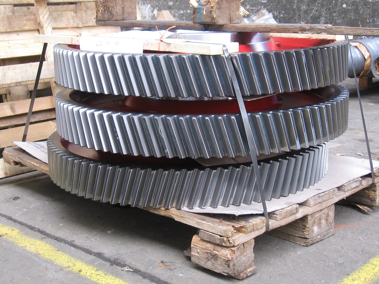 Large helical gears stacked and ready for shipment