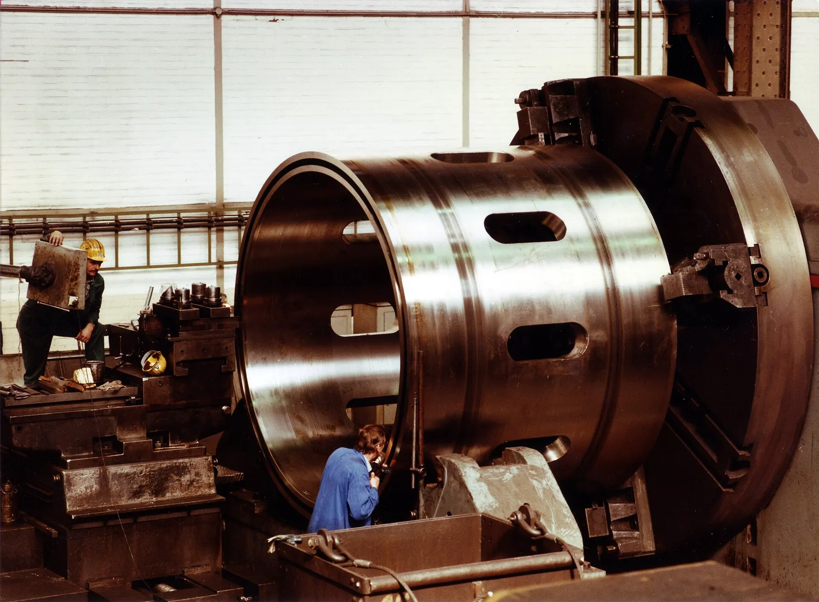Large forged ring being machined on a heavy-duty lathe